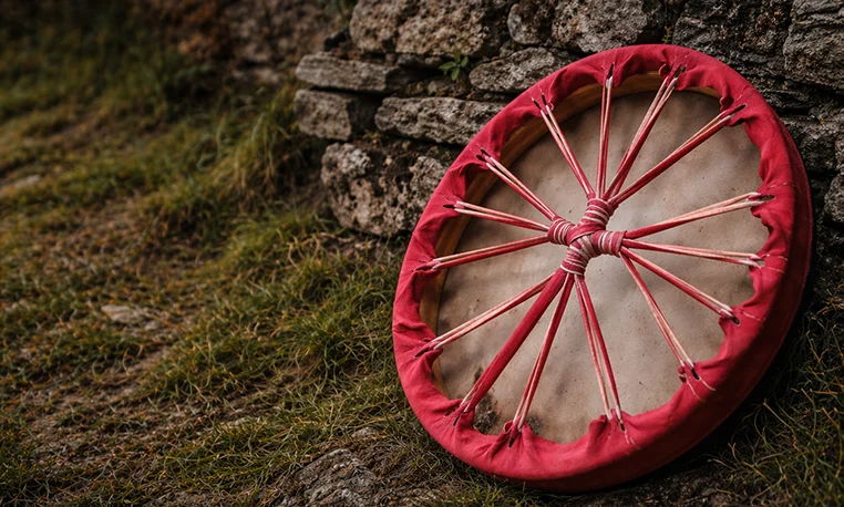 Jane's drum resting against a stone wall